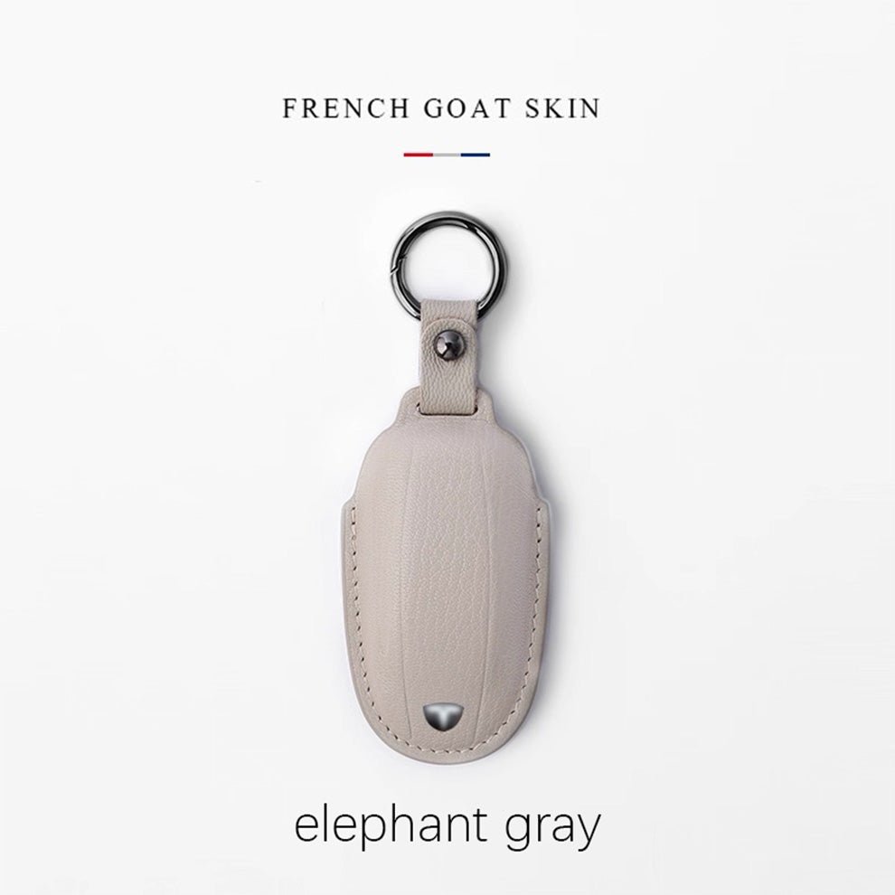 Leather Key Cover with Tesla ( Free embossing of mobile phone number on the leather strap )