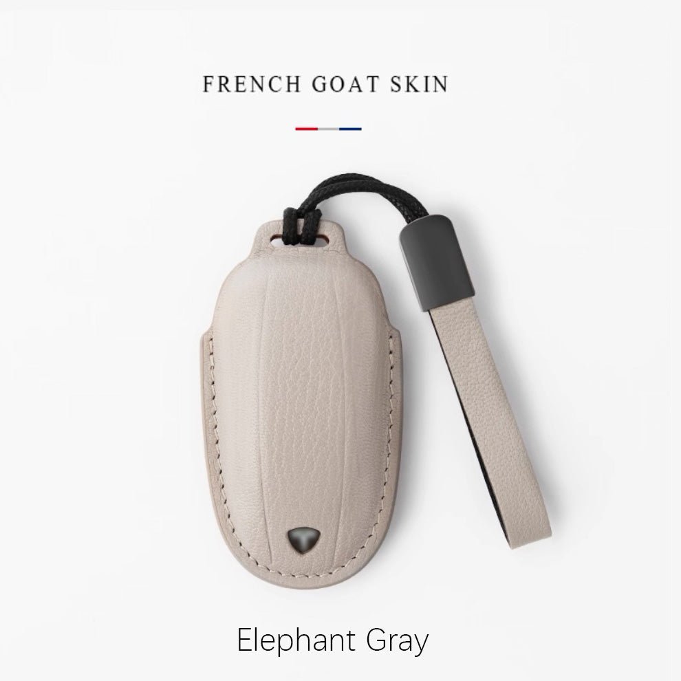 Leather Key Cover with Tesla ( Free embossing of mobile phone number on the leather strap )