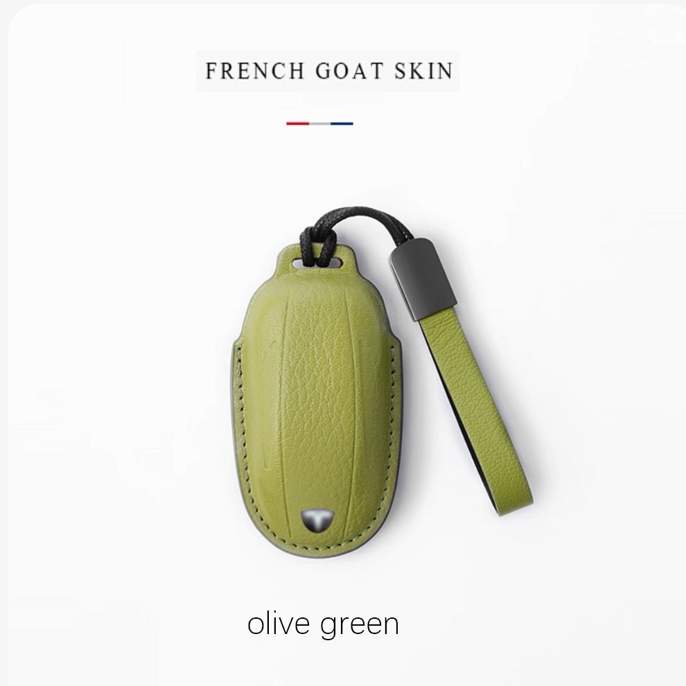 Leather Key Cover with Tesla ( Free embossing of mobile phone number on the leather strap )
