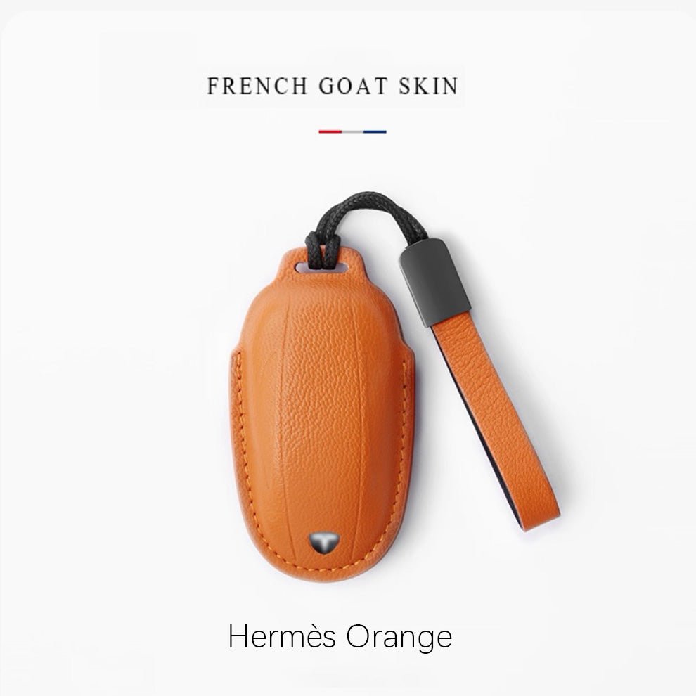 Leather Key Cover with Tesla ( Free embossing of mobile phone number on the leather strap )